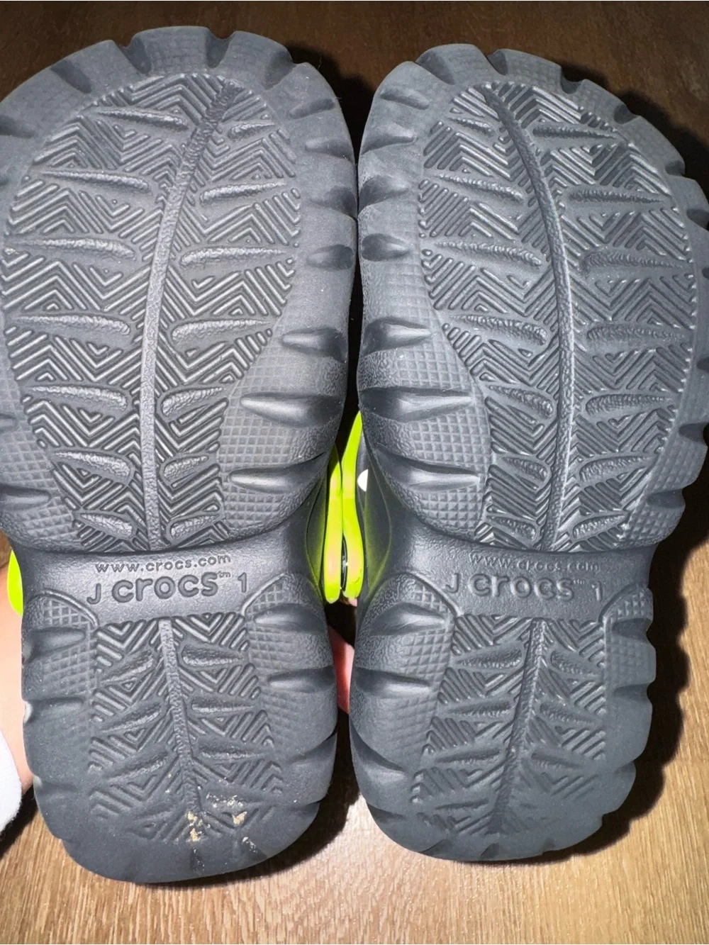 CROCS Kids Black Clogs with Lime Green Heel Strap